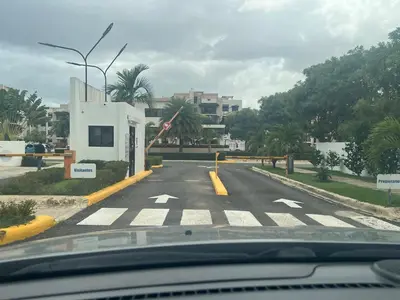 a view from a car of a street with a building at Luxurious and comfortable 1 level in Juan López