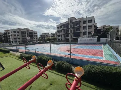 a view of a swimming pool with a tennis court at Luxurious and comfortable 1 level in Juan López