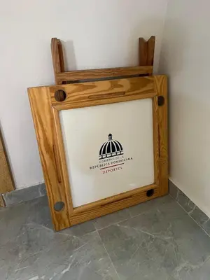 a picture frame sitting on the floor in a room at Villa con Piscina en la Romana in La Romana