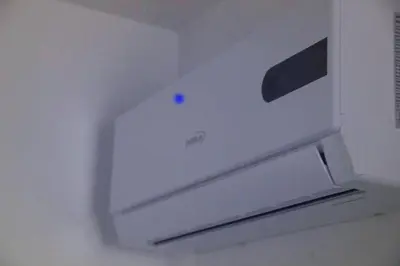 a white nintendo wii box with a blue button at Casa Brisa Mar Hotel in Las Terrenas