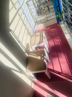 an overhead view of a bench in a room with pink floor at Apartamento Mariela 4 in San Felipe de Puerto Plata