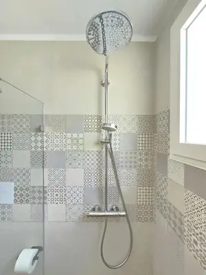 a shower with a shower head in a bathroom at Margarita 102 Private Beach Access Aqua Esmeralda Dominicus in La Laguna