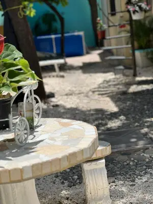 a bench with a toy train sitting on it at Beautiful Caribbean Coast Residence in Santo Domingo