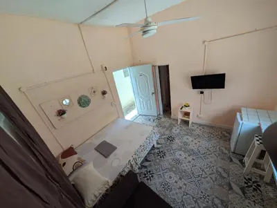 an aerial view of a living room with a door at Casa de huéspedes El Español in Santo Domingo