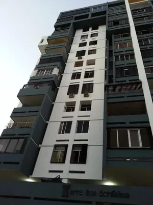 a tall building with many windows on it at Torre san geronimo 1109 apartamento 10-06 in Santo Domingo