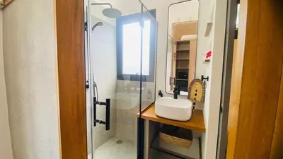 a bathroom with a sink and a glass shower at Private Pool Villa With Parking in Las Terrenas