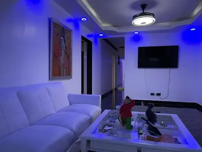 a living room with a white couch and a table at Bella casa en lo alto in El Seis