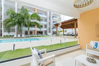 a view of the pool from the living room of a house at Chic Bayahibe 2BR in Sunshine near Bayahibe Center in Bayahibe