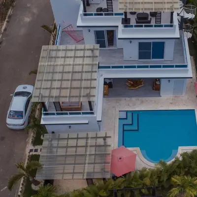 an aerial view of a house with a swimming pool at Crown 1 in Puerto Plata