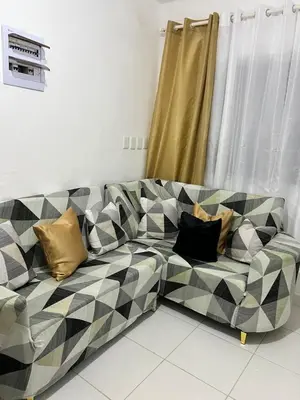 a black and white couch in a living room at Villa Medrano Home in Punta Cana