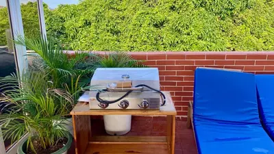 a stove on a table next to a brick wall at Sea Near and Beach a few minutes walking Top Location by RHV Living in San Felipe de Puerto Plata