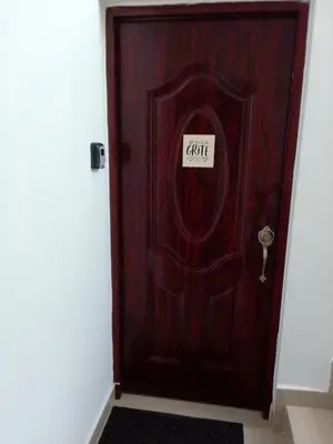 a wooden door with a sign that reads caffe at Villa del mar in Bayahibe