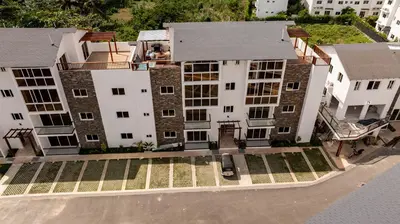an aerial view of a large white building at Armonía Las Terrenas in Las Terrenas