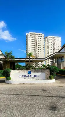 a sign in front of a resort with tall buildings at Modern, Comfortable, Close to Beaches in Colorado