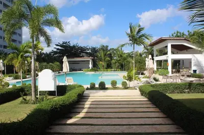 a resort with a swimming pool and a house at Modern, Comfortable, Close to Beaches in Colorado