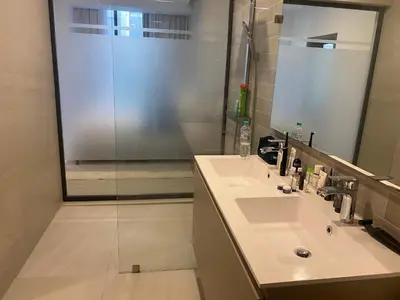 a bathroom with a sink and a shower at Playa Matilde, apartamento de lujo in Punta Cana