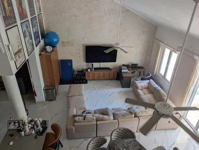 an overhead view of a living room with a couch and a tv at Hispanola Beach 3 Bdr Outdoor Jacuzzi in Sosúa