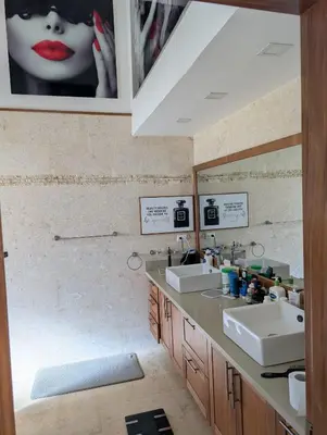 a bathroom with two sinks and a mirror at Hispanola Beach 3 Bdr Outdoor Jacuzzi in Sosúa