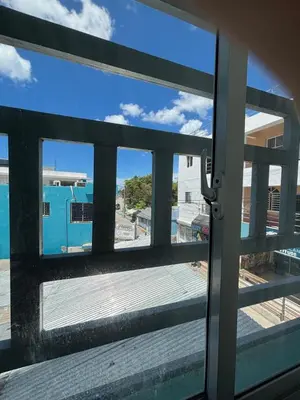 a view from a door of a balcony at Calle Roma in Bayahibe