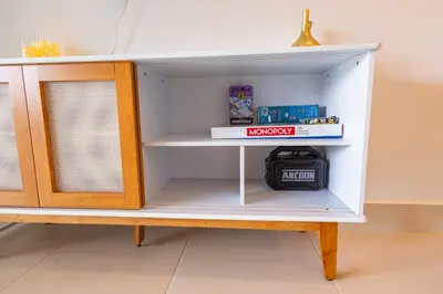 a white cabinet with a shelf with a drawer at View to paradise, One bedroom apartment in Puerto Plata