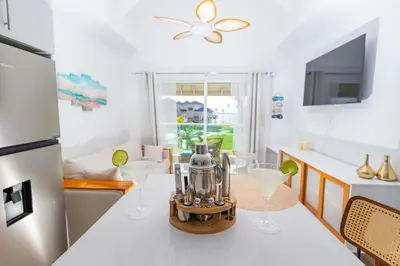 a kitchen with a table with a coffee maker on it at View to paradise, One bedroom apartment in Puerto Plata