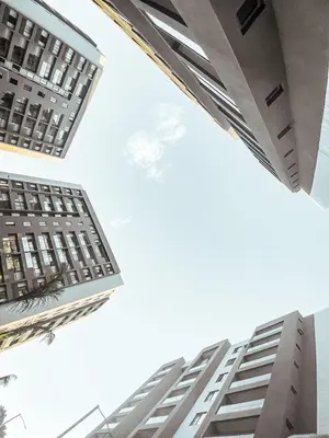 two tall buildings looking up into the sky at Livera park in Santiago de los Caballeros