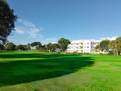 a view of the green at the golf course at Maple Beach Residences Punta Cana in Punta Cana