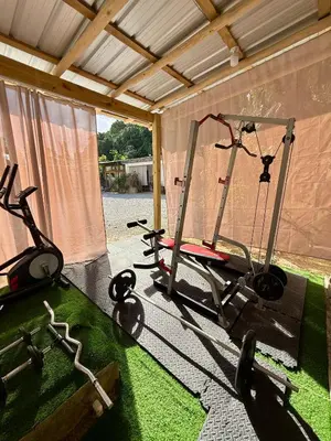 a gym with two exercise bikes in a room at Residencia AKKMA - Autentico y dominicano con AC in Las Terrenas