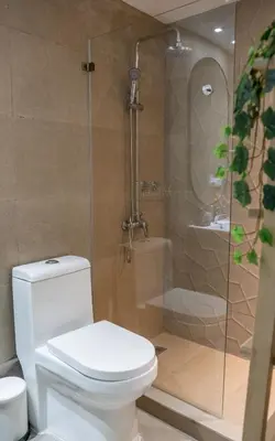 a bathroom with a toilet and a shower at Beach Pool Jacuzzi Wifi Netflix Gym 5 Guests in Villas del Mar