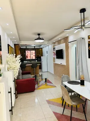 a living room with a couch and a table at Apartamento en la romana residencial los García I in La Romana