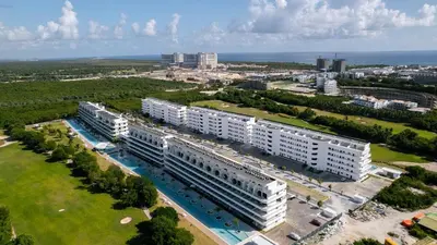 an aerial view of a city with white buildings at Caribbean Heaven in Punta Cana