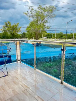 a view from the deck of a house with a pool at Ocean Vibes - Bayahibe in Bayahibe