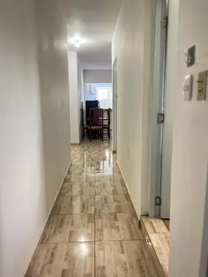an empty hallway with a wooden floor in an apartment at Ocean Vibes - Bayahibe in Bayahibe