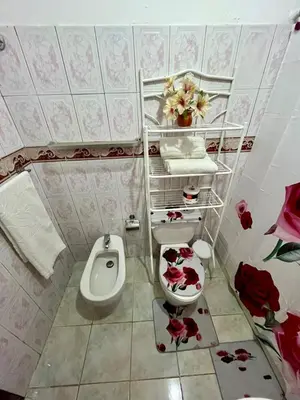 a bathroom with a toilet and a bidet at Apartamento in Boca Chica