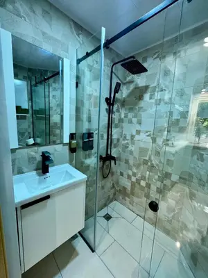 a bathroom with a shower and a sink at Affordable room near the beach in San Felipe de Puerto Plata