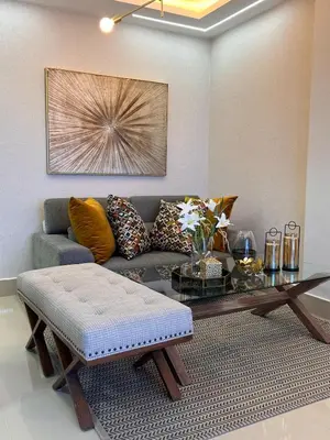 a living room with a couch and a coffee table at Beautiful luxury apartment in San Juan de la M in SJM