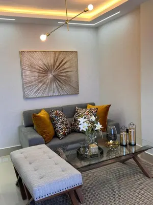 a living room with a couch and a coffee table at Beautiful luxury apartment in San Juan de la M in SJM