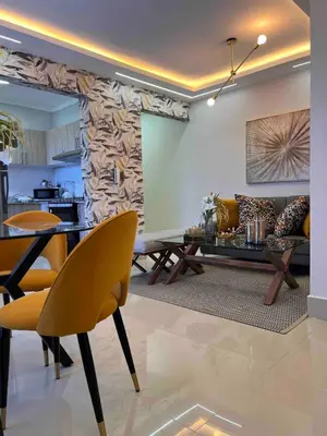 a living room with a couch and a table at Beautiful luxury apartment in San Juan de la M in SJM