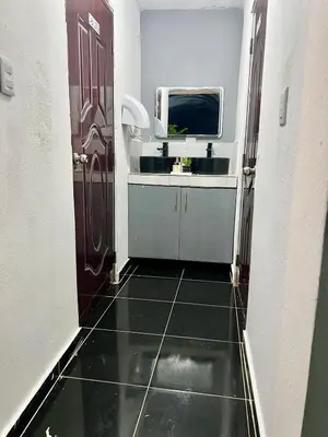 a bathroom with a sink and a mirror at Villa Seven in Guerra