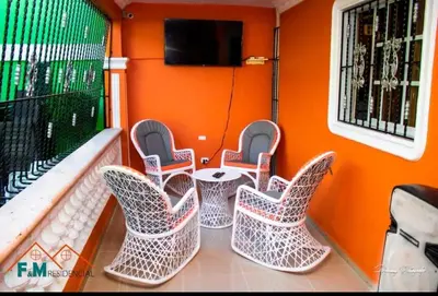a group of chairs and a table on a boat at Villa en Pedernales in Pedernales