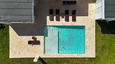 an overhead view of a swimming pool in a yard at Luxury Villa, Pool & Prime Location in Sosúa