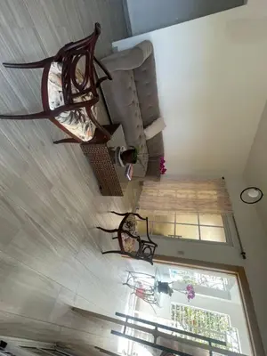 an overhead view of a living room with a chandelier at Apartmento, siéntete en casa in Monte Adentro