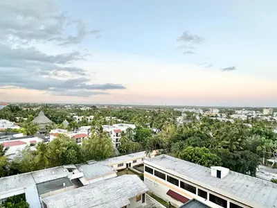an overhead view of a city with trees and buildings at Tropical Seaside Bliss DGM Resort at BocaChica in Boca Chica
