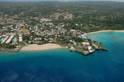 an aerial view of a small island in the ocean at 1 bedroom apartment with a swimming pool in the city Center in Sosúa