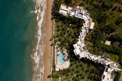an overhead view of the beach and the ocean at 1BR Ocean View Luxury Beachfront in Cabarete in Cabarete