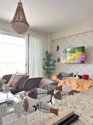 a living room with a couch and chairs and a table at Your oceanfront paradise in La Puntica de Juan Dolio