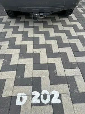 a car parked in a parking lot with the words at Burungos Place at Terrazas del Caribe in Ensanche Savica de Mendoza