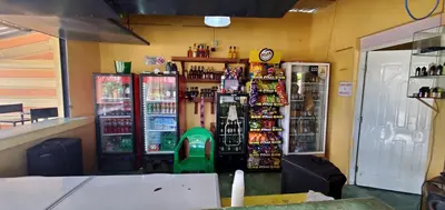 a store with two vending machines in a room at hotel las yayas la vega in Concepción de La Vega
