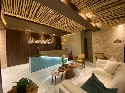 a living room with a couch and a table at Residential Boca del Mar Tower III Apart 802 in Boca Chica