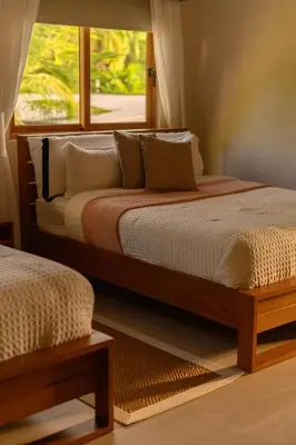 a bedroom with two beds and a window at New! Gorgeous Portillo Beach Villa W Pool & Staff in Abra Grande